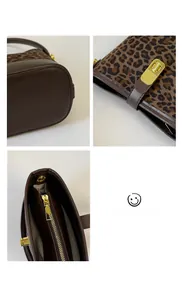 Détails du sac seau léopard avec fermoir doré et base en cuir de haute qualité