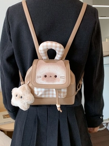 Brown mini backpack with cartoon cat patch and star charm for daily casual commute
