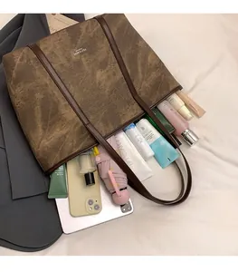 Brown vintage textured tote bag interior showcasing large capacity for daily essentials