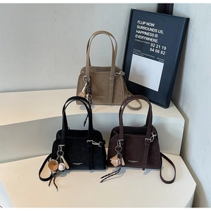 Chic suede minimalist pillow bags in khaki, black, and coffee with baseball charms