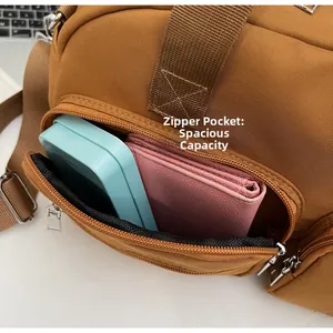 Close-up of exterior zipper pocket on canvas tote bag showing large storage capacity