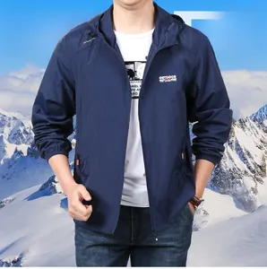 Detail view of navy blue hooded sun protection jacket with outdoor logo and orange zipper