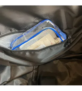 Detail view of the dry and wet separation compartment with a waterproof zipper in the travel bag
