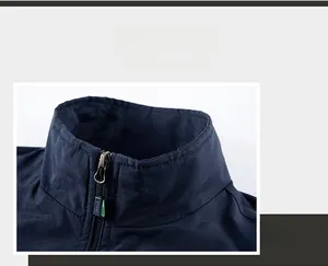 Detail view of the stand-up collar and sports zipper on the navy outdoor functional vest