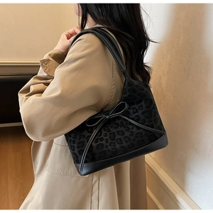 Detail of leopard print velvet tote bag with leather bow and trim for women