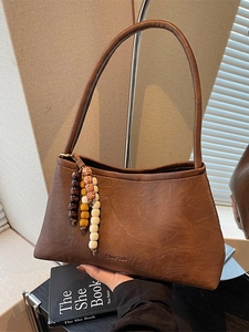 Vintage brown leather underarm bag with unique colorful beaded charms for women