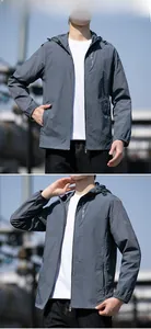 Close-up of a men's dark gray hooded sun protection jacket with waterproof chest zipper