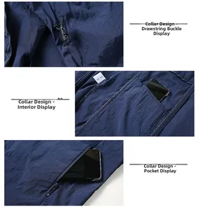 Detail of dark blue sun protection jacket featuring drawstring toggles and zipper pockets