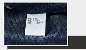 Detail of breathable dark blue mesh lining and care label on outdoor utility vest