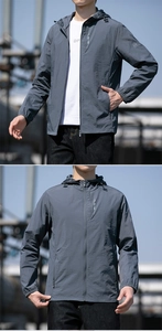 Detail view of the deep gray sun protection jacket showing the adjustable hood and zipper