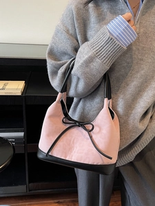 Pink and black large tote bag with bow detail and long shoulder strap for women