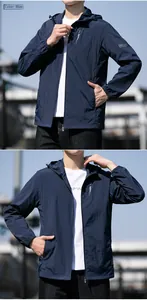 Detail of royal blue sun protection jacket with drawstring hood and elastic cuffs