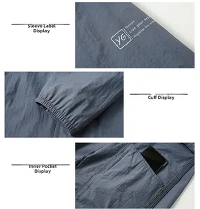 Detail of gray-blue sun protection jacket featuring elastic cuffs and inner phone pocket
