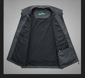 Detail of breathable black mesh lining and inner pocket on men's outdoor utility vest