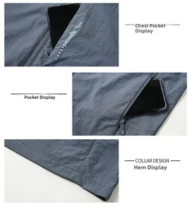 Close-up of gray-blue sun protection jacket featuring zipper pockets and fine fabric texture