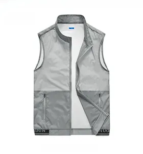 Detailed view of gray lightweight breathable skin vest with zipper and DUN letter trim