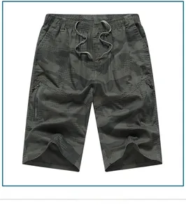 Detail of cargo shorts with camouflage pattern, elastic drawstring waist and zip pocket