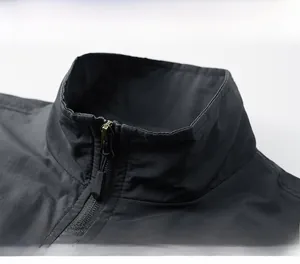 Close-up of durable windproof stand-up collar and premium metal zipper on cargo vest