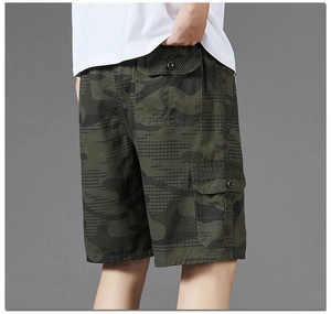 Detail view of men's camouflage cargo shorts showing functional back pockets and cotton fabric