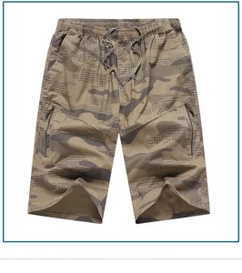 Detailed view of camouflage cargo shorts featuring elastic drawstring waist and zip pocket
