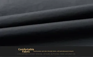 Close-up detail of high-density quick-dry synthetic fabric with fine twill texture