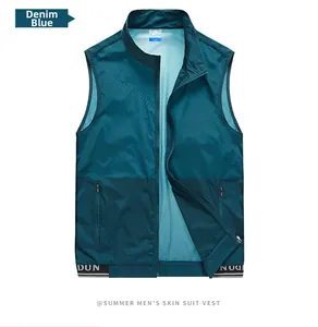 Detail of blue men's skin suit vest showing breathable fabric and zippered pockets