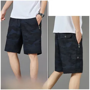 Detail of blue camo cargo shorts featuring multi-pocket design and ripstop texture