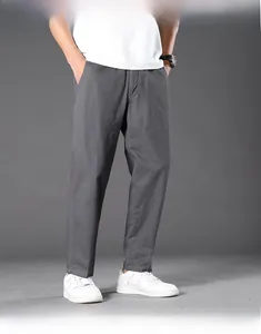 Macro detail of dark grey wrinkle-resistant cotton trousers for men with side pockets