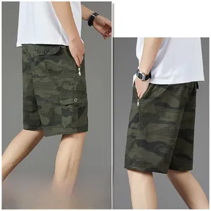 Detail view of military green camouflage cargo shorts with functional side flap pockets