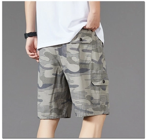 Rear view of men's loose camouflage cargo shorts showing back pockets and cotton texture