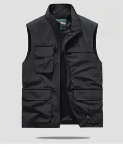 Detail of black tactical vest featuring functional flap pockets and breathable mesh lining