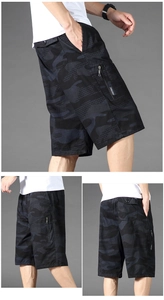 Detail view of camouflage cargo shorts showing ripstop texture and multiple utility pockets
