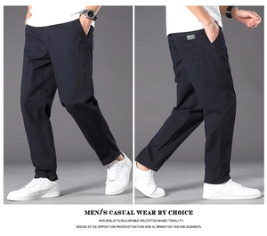 Detail view of cotton casual trousers showing the classic straight-cut fit and fabric texture