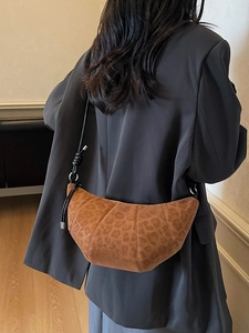 Vintage leopard print croissant bag in frosted suede styled with oversized grey blazer