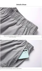 Detail view of men's grey casual pants with elastic drawstring waist and side pockets
