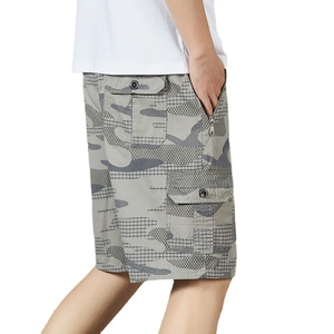 Men's grey camo cargo shorts with side flap pockets and zipper detail on white background