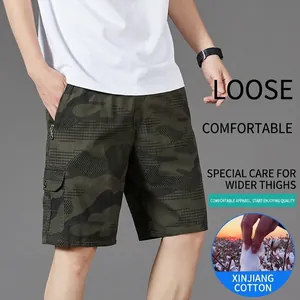 Men's loose cotton cargo shorts featuring a classic camouflage pattern and side flap pockets