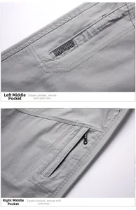 Detail view of the secure zipper cargo pockets on grey cotton casual pants for men