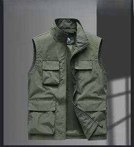 Detail view of military green fishing vest showing mesh lining and multi-pockets