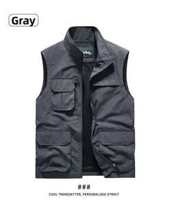 Detail of dark grey multi-pocket outdoor vest with breathable mesh lining and zipper
