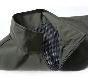 Detail of stand-up collar with zip and breathable mesh lining on men's outdoor vest
