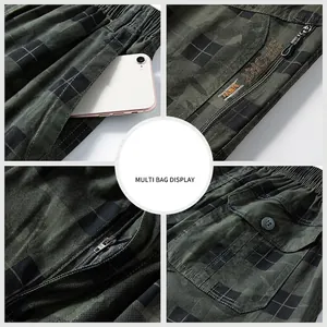 Men's green plaid cargo shorts with multi-pocket design and comfortable elastic waist