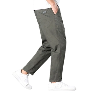 Men's deep olive green straight-leg cargo pants in cotton twill from a 45-degree side view