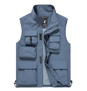 Detail of multi-pocket utility vest showing breathable mesh lining and durable zippers