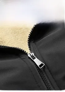 Close-up of a durable silver metal zipper on a men's winter jacket with fleece lining
