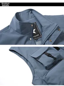 Detail of dark blue outdoor vest featuring standing collar with metal snap and waterproof zipper