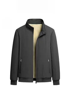 Detail of black winter jacket featuring thick fleece lining and ribbed cuffs