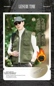 Close-up of reversible thick fleece vest showing olive green fabric and utility pockets