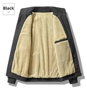 Detail of warm black men's jacket showing soft beige sherpa lining and interior pocket