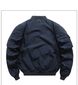 Back view of navy blue bomber jacket with D-ring detail and ribbed knit trim